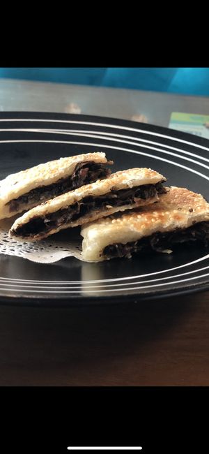 3/4 pickled mushroom pie (I already ate a piece.) it was amazing! at Amrita in Shanghai