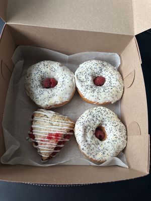 Mannnnnn thee Meyer lemon 🍋 poppyseed are delicious…..❤️  at Strange Matter Coffee - Eastside in Lansing