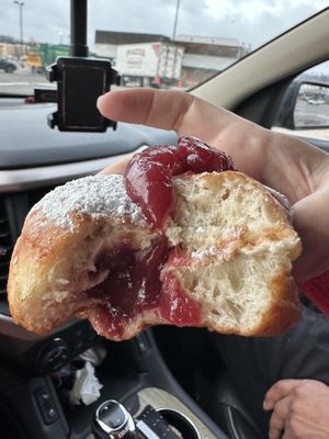 The filled donuts… I’m addicted… strawberry cranberry….  at Strange Matter Coffee - Eastside in Lansing