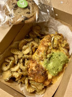 Delivery vegan chili cheese dog with fried pickles, added guacamole, and chocolate chip cookie  at The Dogfather in San Antonio