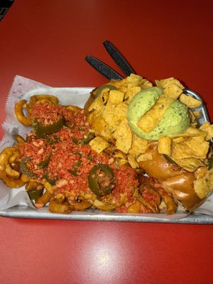 Frito pie dog with sucia style curly fries for the win  at The Dogfather in San Antonio