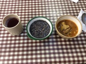 Upon finding a seat in Han Gwa Chae, the owners will immediately serve you with tea, black sesame rice porridge and a spicy veggie stew at Han Gwa Chae - 한과채 in Seoul