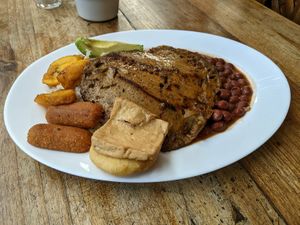 Vegan version of an Ecuadorian lunch plate. Amazing flavors! at Donde Gopal in Quito