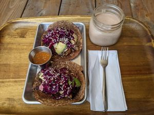 Wild mushroom and BBQ brisket tacos with mossy cacao elixir. at ATX Food Co in Austin