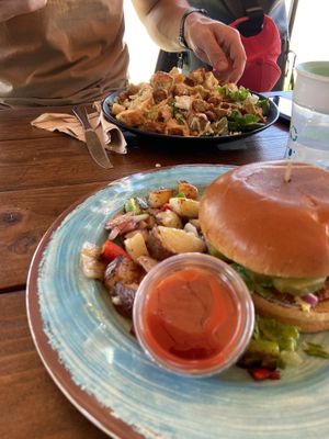 Caesar salad and chickn burger with country potatoes at Vida Eatery  in Bakersfield