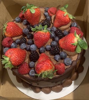 Delicious 8” Chocolate Cake with Chocolate Frosting and Mixed Berries - Was a hit!  at Vida Eatery  in Bakersfield