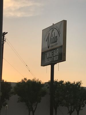 Street sign for Vida Vegan Co at Vida Eatery  in Bakersfield