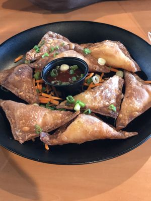 Wontons with dipping sauce at Vida Eatery  in Bakersfield