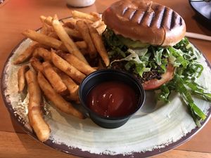 Fried chicken sandwich with fries  at Vida Eatery  in Bakersfield