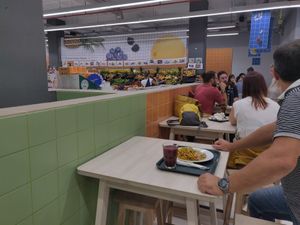 Food court eating area at Natura Bolhao in Porto