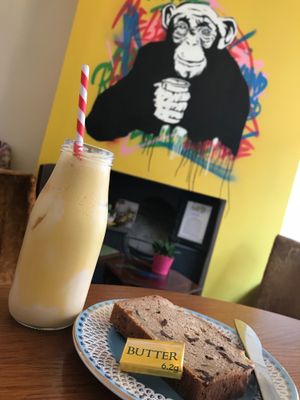 Turmeric latte with vegan chocolate and banana loaf cake at Melbourne in Lichfield in Lichfield