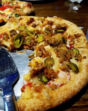 Pacific Rim pizza, vegan cheese subbed for mozz and tempeh subbed for meat. Asked for bbq sauce on the tempeh but they forgot :(  at Mellow Mushroom in Lutz