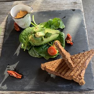 Lunch: Avocado with sweet potato hummus on toast.  at Het Ruiterhuys in Castricum
