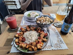 Sweet and sour tofu, Caesar salad, courgette spaghetti with cashew sauce at Veg Joy in Rome