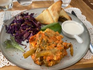 Seitan fillet in crust, with spicy oven baked pumpkin, and purple cabbage with mustard  at Veg Joy in Rome