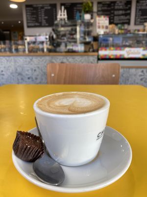 Oat flat white & vegan hazelnut truffle   at Chococo in Horsham