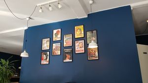 Pictures hanging on the wall that gives a pleasant atmosphere to the restaurant. at Dhaba in Vordingborg