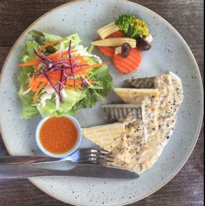 tofu steak woth coconut milk and pepper sauce at Pun Pun Organic Vegetarian Restaurant - Wat Suan Dok in Chiang Mai