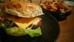 Cheese burger and fries at Attila Hildmann Organic Snackbar II in Berlin