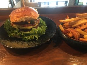 Burger and fries  at Attila Hildmann Organic Snackbar II in Berlin