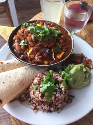 Four bean chilli chipotle with jackfruit fritter and wild rice   at Eat Your Greens in Bristol