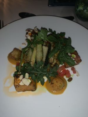 jerk pumpkin with israeli cous cous and zucchini frite   at The Tides Restaurant in Holetown