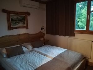 Mountain cabin decorations, beautiful nature outside at Hotel Ribno in Bled