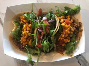 2 soy chorizo and 1 falafel taco with all of the “craft taco” toppings at Screaming Goat in Sarasota