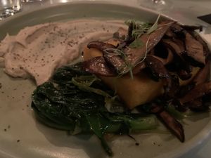Wild mushrooms, garlic polenta, truffle cream and sautéed greens. Amazing! at No Bones in Byron Bay
