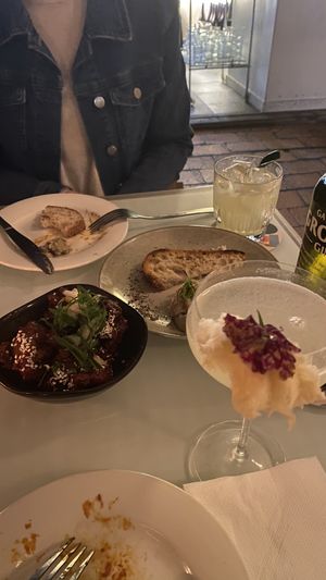 Pictured is the mushroom pate and korean chick’n with cheap thrills and fairy blossom cocktails   at No Bones in Byron Bay