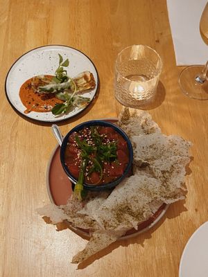 Stuffed Zucchini flowers on romesco and watermelon siviche with nori crisps  at No Bones in Byron Bay