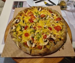 Green pizza at Mystic Pizza - Exarchia in Athens