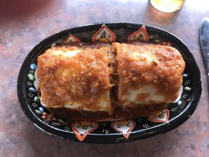 Sante Fe burrito with Beyond chicken strips “drowned” in red sauce (a green sauce option is also available.  at Baby Salsa Mexican Restaurant in Nanaimo