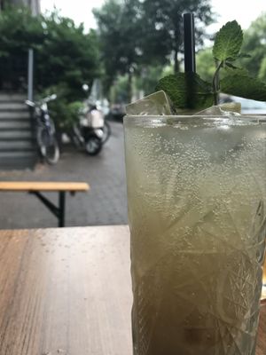 Delicious and refreshing ginger beer w/lime & mint. Wish I requested no straw!! at Greenwoods in Amsterdam
