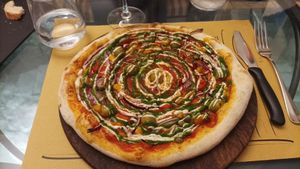 Pizza chef at Life Bistrot in Volterra
