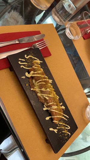 Chestnut flour roll with a kind of citrusy filling. at Life Bistrot in Volterra