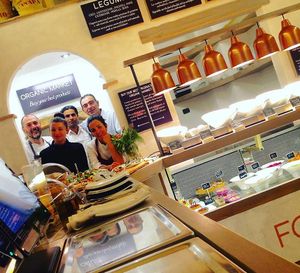 Food buffet, scales and our staff at Life Bistrot in Volterra