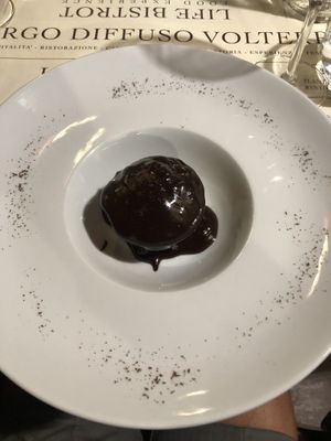 Coconut pie with hot chocolate cream and coffee. at Life Bistrot in Volterra