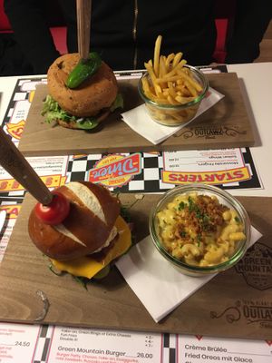 Mac n cheeze burger and fries, green mountain burger and Mac n cheeze at Outlawz in Bern