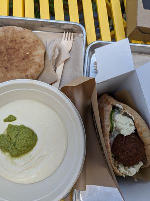 Hummus w lemon zhoug and seasonal falafel at Shouk - Union Market in Washington