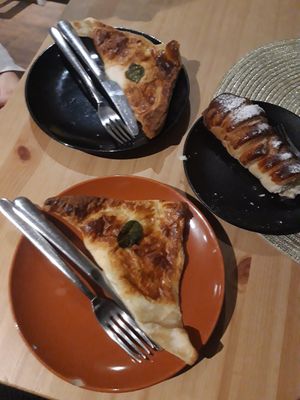 Possibly vegan khachapuri and cream filled pastry? at Purée Health Bar in Tallinn