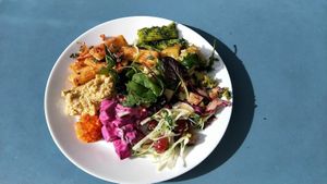 salad with hummus, baked pasta and peas.  at Estin in Copenhagen