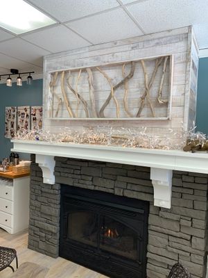 Cute fireplace with seating in front at Third Coast Bakery in Traverse City