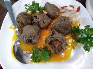 Homemade bamboo charcoal in pumpkin sauce at New Fut Kai Vegetarian 新佛界素食 in Central Singapore