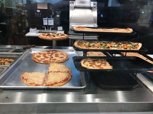 Variety of vegan pizza choices  at Kustom Pizza & Subs in Wheaton