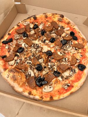 VEGAN pizza! Vegan sausage, Vegan cheese (not pictured, been out for awhile) and olives and mushrooms and yummy   at Arka Pizzeria in Bodrum