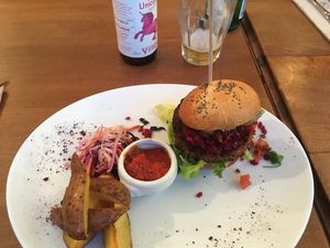 Burger + coleslaw + potatoes   at Cafe Mutin in Geneva
