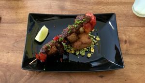 Brochette de tempeh, abricot et pain au maïs at Cafe Mutin in Geneva