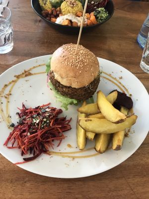 Mushroom burger with oven-baked fries and beetroot salad  at Cafe Mutin in Geneva