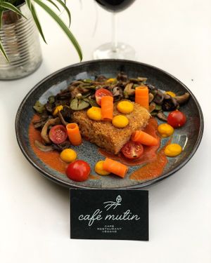 Plat “New Orleans” aux épices cajun at Cafe Mutin in Geneva